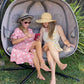 FlowerHouse Hanging Pumpkin Patio Loveseat Chair with stand-Dream Catcher - with two models sitting in chair